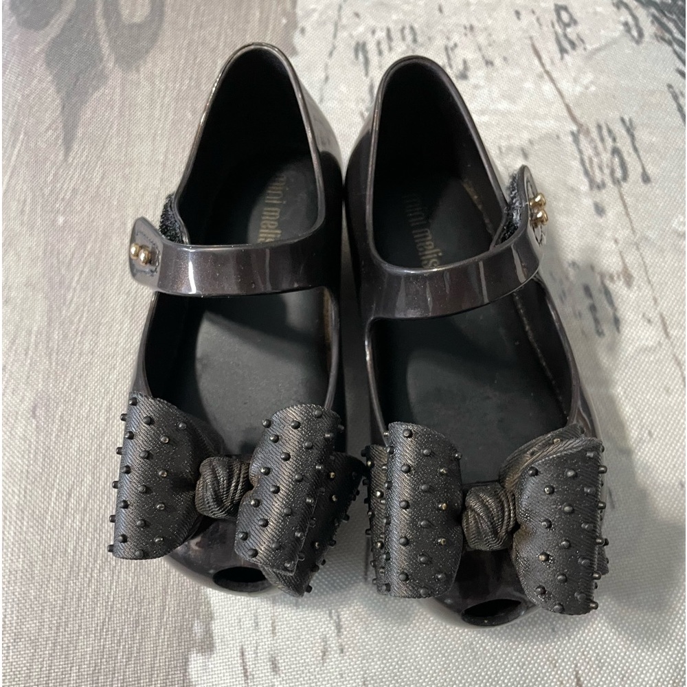 Mini Melissa black dress shoes with bows. Toddler size 8
